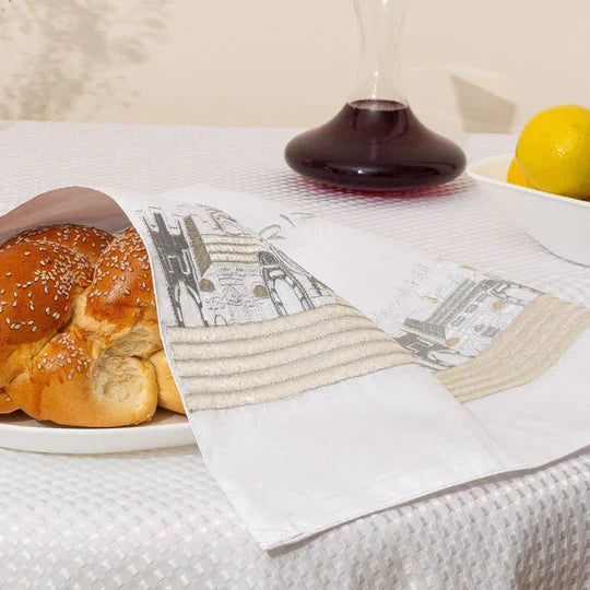 A designed challah cover with the inscription 