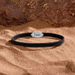 Opulent Security Men’s Evil Eye Black String Bracelet