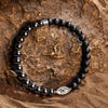 Stay Grounded -  Hematite Matte Onyx Evil Eye Charm Bracelet